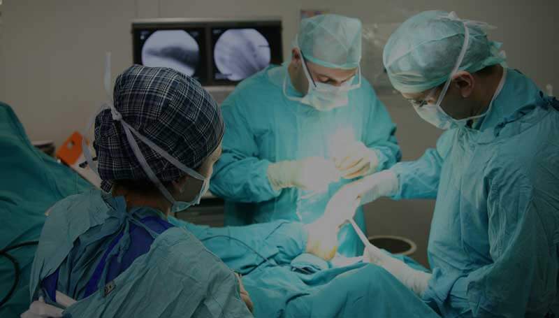 Surgeons performing foot surgery